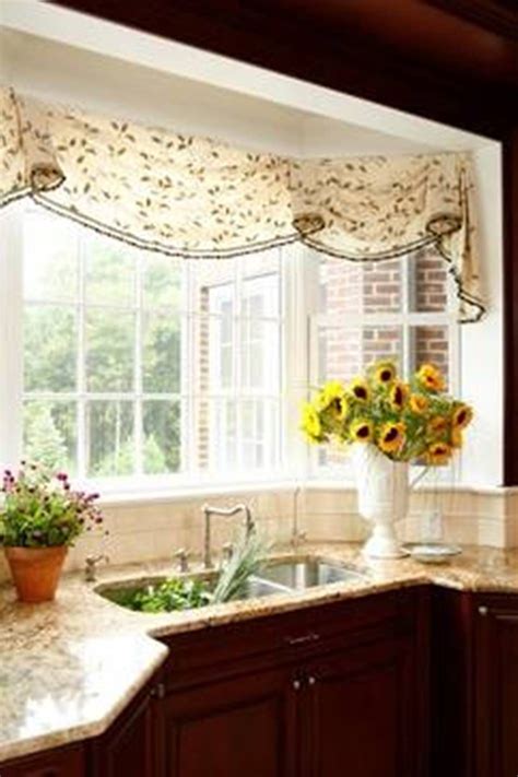 Make a feature of a classic bay window with a combination of blinds, to accentuate the shape of the bay, and elegant drapes to highlight the height. bay window valances - Google Search | Bay window treatments, Kitchen bay window, Custom window ...