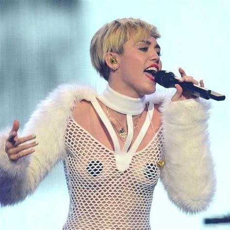 Miley Cyrus From Stars Wearing Nipple Tape E News