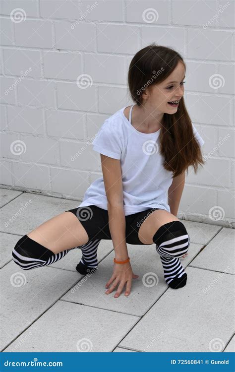 Teenage Girl Crouching Stock Image Image Of Attitude 72560841