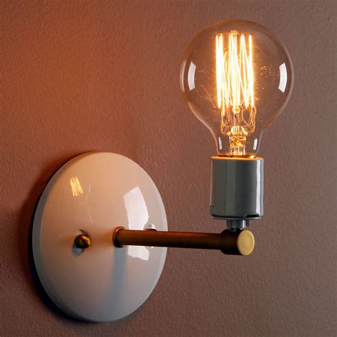We're a small team, and we run a little workshop based in china. Minimalist Wall Light By Unique's Co. | notonthehighstreet.com