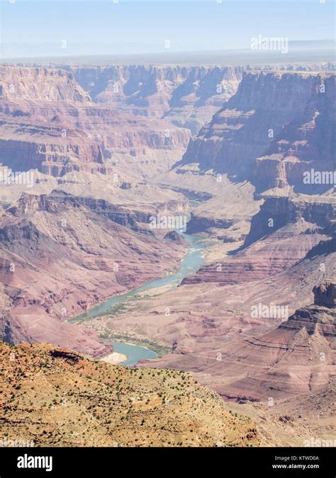 Sunny Aerial View Including The Colorado River At The Grand Canyon