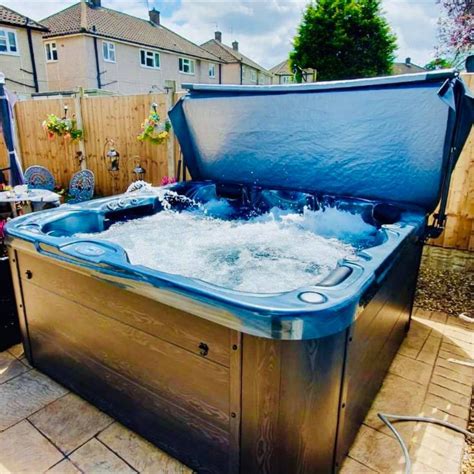 Beautiful hot tub just installed in this UK garden | Tubs for sale, Hot
