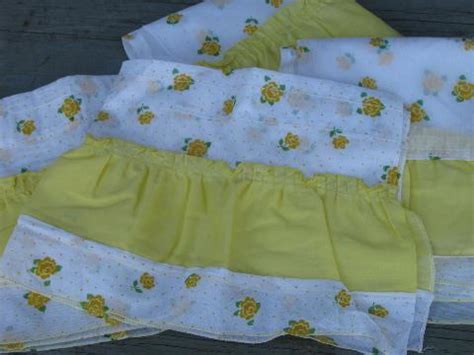 crisp white kitchen curtains  yellow flocked flowers