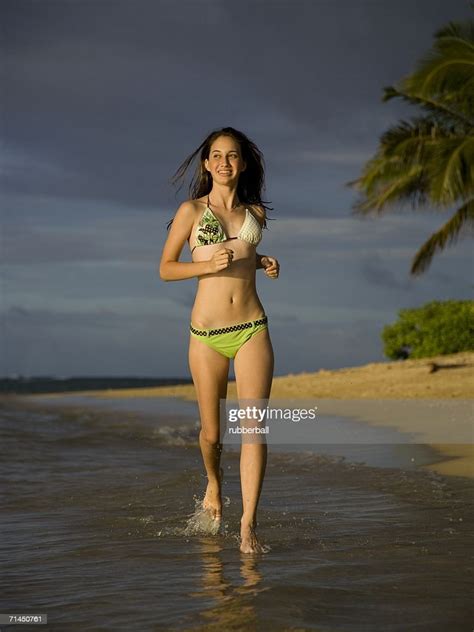 Teenage Girl Running On The Beach Photo Getty Images