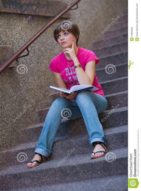 Teen Girl With Book On The Stairs Stock Image Image