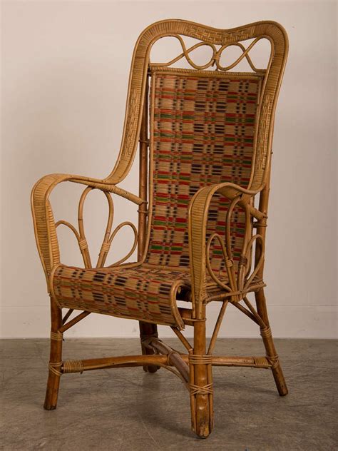 40 cm its reinforced rattan structure is ultra stable. Vintage woven rattan armchair, France c.1920 at 1stdibs