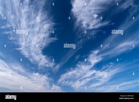 High Level Cirrus Clouds With A Blue Sky Stock Photo Alamy