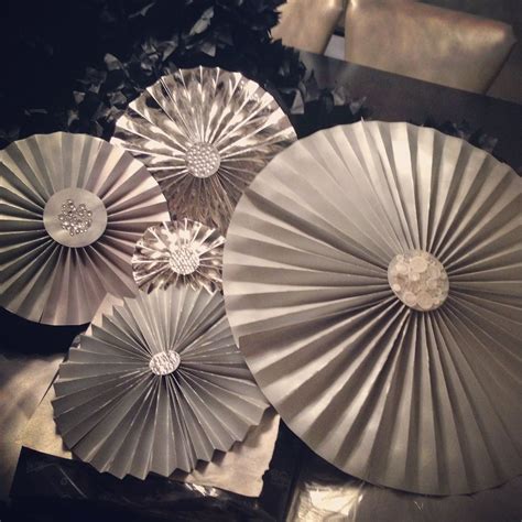 Silver pin wheels. Paper decorations. | Paper decorations, Birthday decorations, Decor