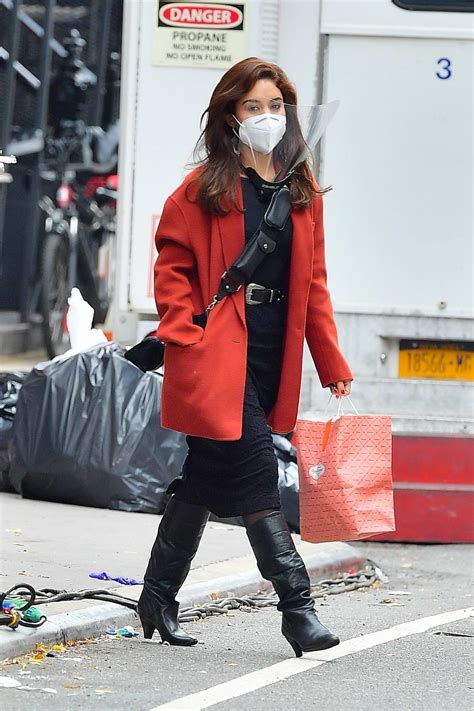 Vanessa Hudgens Dons A Burnt Orange Coat Over An All Black Outfit On The Set Of The Tick Tick