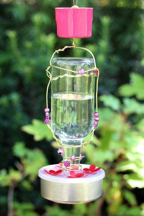 You can also tuck the cut flowers in the bottle without cutting it. Pin by Tiana Steuck on projects | Humming bird feeders ...