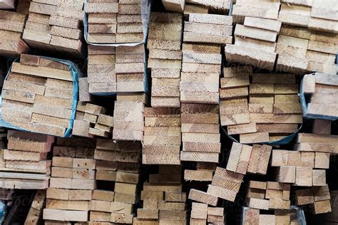 Various Wood Planks Piled In A Stack By Stocksy Contributor Lior