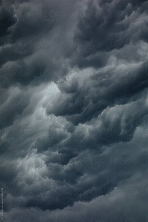 Dramatic Storm Dark Rainy Clouds Moving Over The Sky By Stocksy