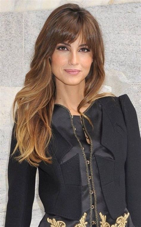 A combination of different lengths layers are cut all through this dark mane to lighten the length making it easy to style into the fabulous shape best suited to compliment a long face. Nice Hairstyles for Oval Faces Women's 2018