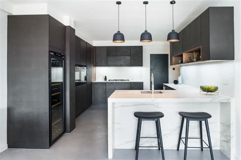 One section of the counter is used for cleaning while the other is used for cooking and meal preparations. L Shape Kitchen in a modern London apartment - Contemporary - Kitchen - London - by Elan ...