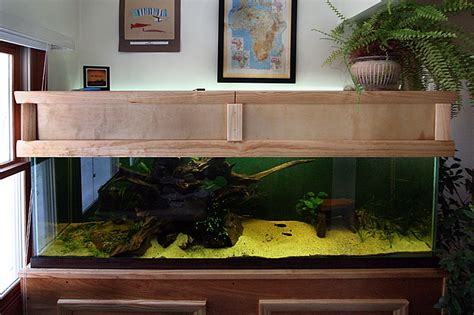 This was built based on plans from the linked website (i didn't design it, just used it). How To Build A Fish Tank Canopy