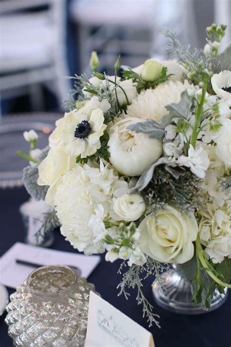 • wedding garlands can be made with stunning fresh flowers. Floral centerpiece with white hydrangeas, anemones, white ...