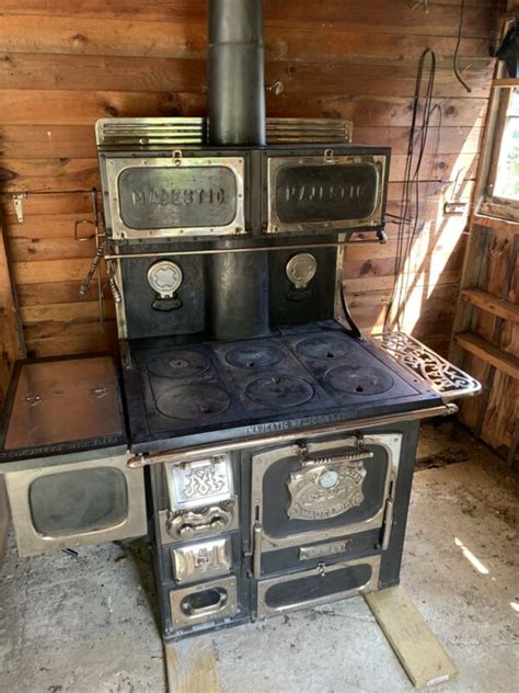 A lighted match is another example of a. antique Coal/wood cook stove, 1911 Great Majestic wood/coal stove -- Antique Price Guide Details ...