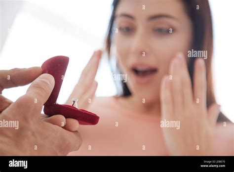 Close Up On Male Hand Holding Engagement Ring Stock Photo Alamy