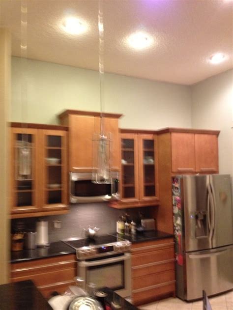 The only issue is usually drawers. What to put above kitchen cabinets in a TALL kitchen?
