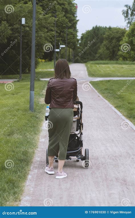 Young Mother Walks With Her Baby Editorial Image Image Of Love