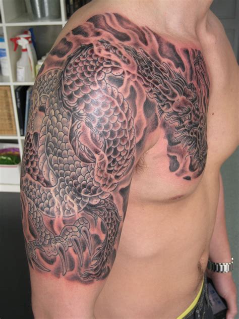 Download images library photos and pictures. Dragon Tattoo on Chest Designs, Ideas and Meaning ...