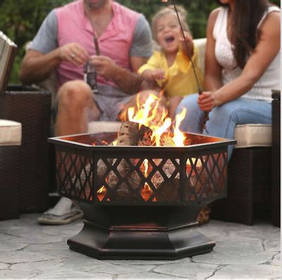 Share those campfire stories over decorative outdoor fire pits, propane fire pits, and fire rings that add outdoor ambiance and warmth. 24 Inch Steel Distressed Bronze Lattice Design Fire Pit ...