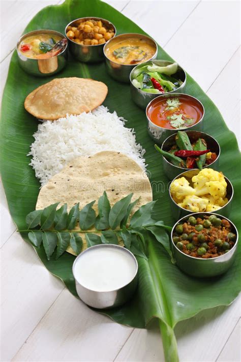 Top south indian restaurants that should be on every hyderabadi s list. South Indian Meals Served On Banana Leaf Stock Photo ...