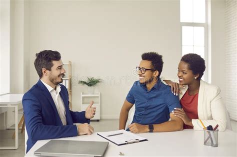 Happy Ethnic Couple Make Deal With Realtor Stock Image Image Of Broker Buyer 247025965