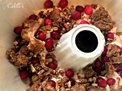 Pour 1/2 of cake batter into pan, sprinkle sugar, cinnamon and nut mixture over batter. Estelle's: CHRISTMAS CRANBERRY PECAN COFFEE CAKE