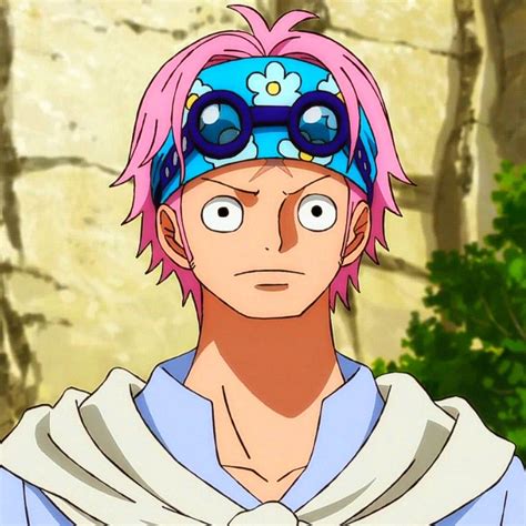An Anime Character With Pink Hair And Goggles On His Head Staring At The Camera