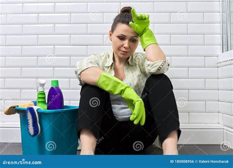 Tired Woman Doing House Cleaning In Bathroom Fatigue Stress