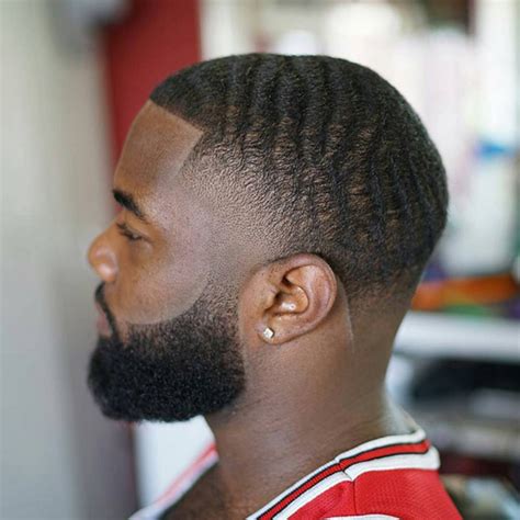 I enjoy recommending this haircut for black men with natural hair who aren't afraid of spending time changing their look from day to day. 30 Cool Black Men Haircuts 2016 | African American ...