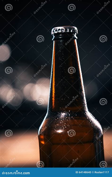 Dark Bottle Of Dark Beer On A Blurred Background Stock Photo Image Of