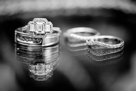 Wide band rings make a statement with the extra space for dazzling diamonds, colorful stones, or design details. Our Wedding rings... the 3 stones represent... GOD in the center.. as we stand by HIS side ...