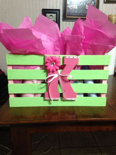 Baby gift baskets filled with baby accessories from www.kimsgiftbaskets.com. Baby shower gift! Crate from Walmart painted to match ...