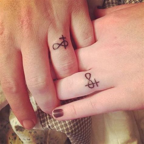 Pictures of the best tattoos marriage finger tattoos tattoo ideas. 40 Awesome Wedding Band Ring Tattoos | Wedding band tattoo ...