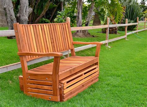 Now let's look at benches for your garden or yard. Outdoor Wooden Glider, Redwood Outdoor Rockers