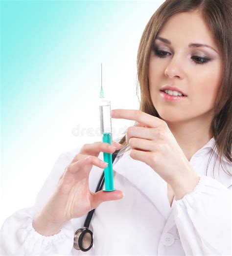 A Young Female Doctor Holding A Syringe Stock Photo Image 21106036