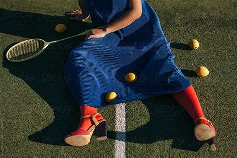 Creative Female Lying On Tennis Court By Sergey Filimonov