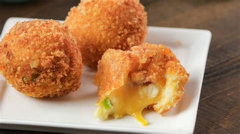 Drop large spoonfuls of the potato mixture into the frying pan. Loaded Fried Mashed Potato Balls - YouTube