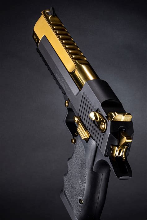 Magnum Research Introduces Exclusive Black And Titanium Gold Desert