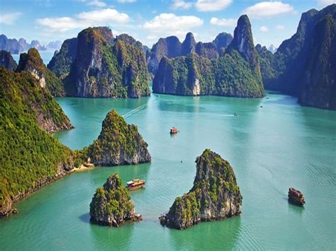 Halong bay is a beautiful natural wonder in northern vietnam near the chinese border. Battle of the most wonderful bays in Vietnam - Halong Bay ...