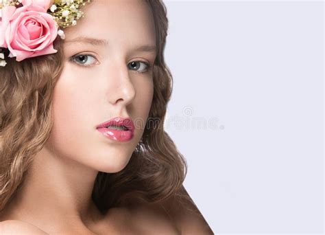 Beautiful Girl With Flowers In Her Hair And Pink Makeup Spring Image