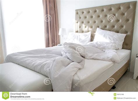 However, during the cold and flu season, zeitler suggests sanitizing your sheets by washing them on a hot/warm cycle. Messy Bedding Sheets And Pillow Stock Photo - Image of ...
