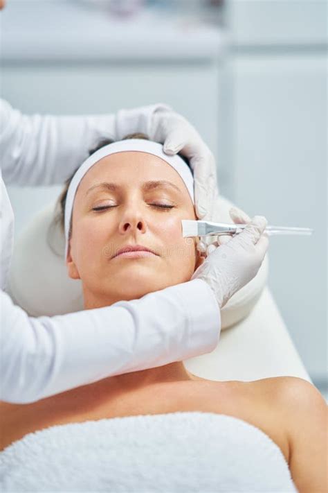 Woman In A Beauty Salon Having Face And Body Treatment Stock Image