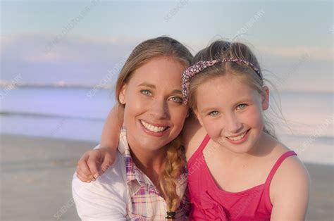 Mother And Daughter Smiling On Beach Stock Image F0066168 Science Photo Library