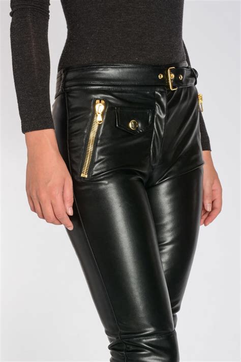 The faux leather surface is generally even due to the extrusion processes. Moschino COUTURE Faux Leather Pants women - Glamood Outlet