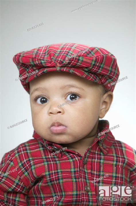 Cute Baby Wearing A Flat Cap Stock Photo Picture And Royalty Free
