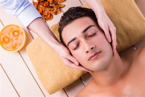 Premium Photo Man During Massage Session In Spa Salon