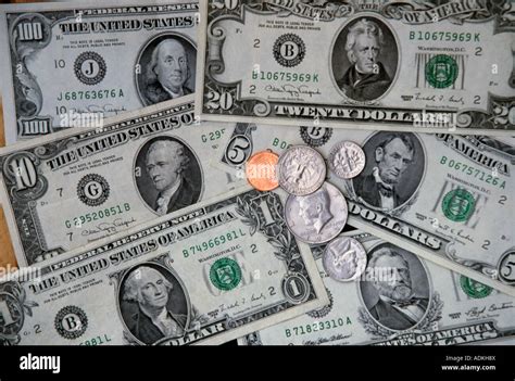 Us Currency Coins And Dollar Bills Stock Photo Alamy